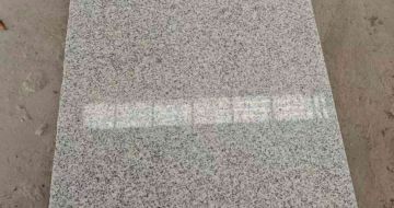 陇南芝麻白光面毛板