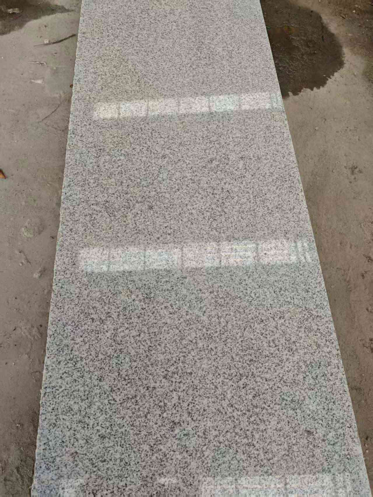 陇南芝麻白光面毛板